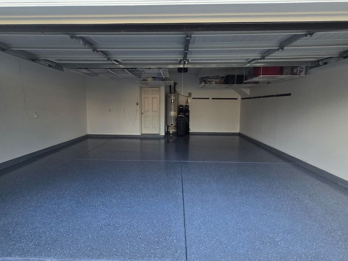Charcoal epoxy garage floor with decorative flake chips